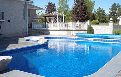 In-ground swimming pool with newly installed liner
